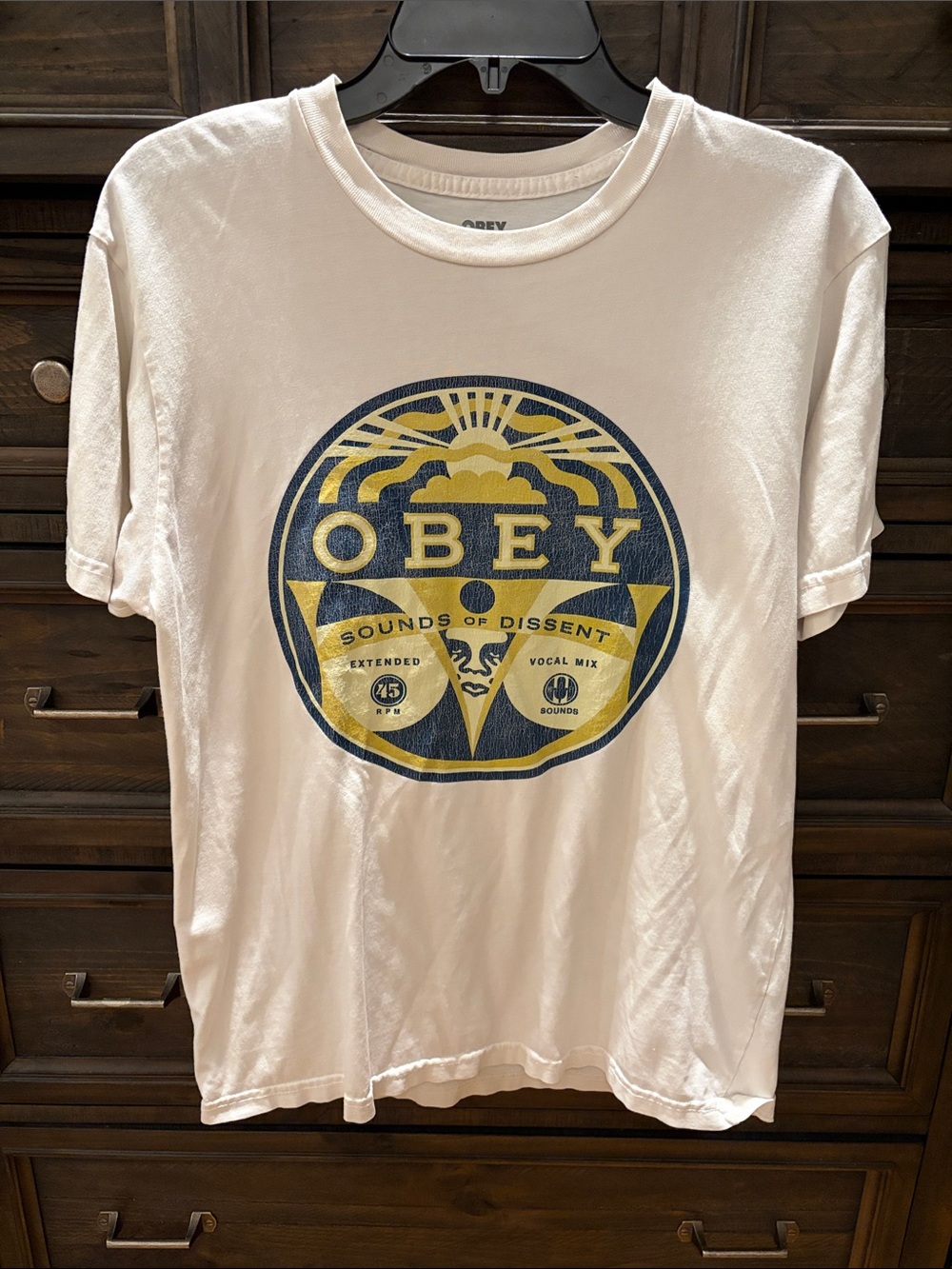 OBEY Men’s Cream Graphic Tee with Yellow & Navy Logo